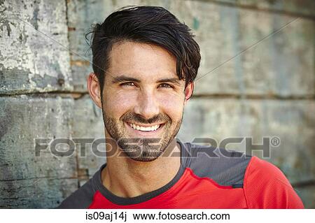 Close up portrait of smiling young man View Large Photo Image Stock Image - Close up portrait of smiling young man. Fotosearch