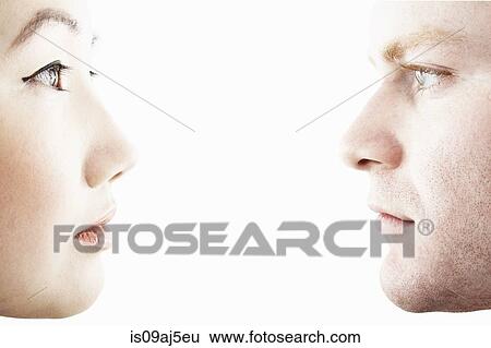 Close up studio portrait of young couple face to face in profile View Large Photo Image Stock Photograph - Close up studio portrait of young couple face to face in profile. Fotosearch