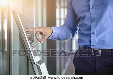 Cropped image of businessman typing in office security code office window View Large Photo Image Stock Photography - Cropped image of businessman typing in office security code office window. Fotosearch
