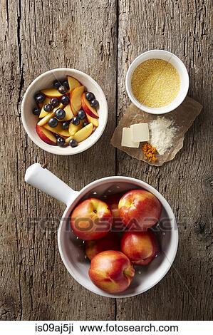 Fresh blueberries and nectarines with dry polenta, butter, orange zest and organic flour View Large Photo Image Stock Image - Fresh blueberries and nectarines with dry polenta, butter, orange zest and organic flour. Fotosearch