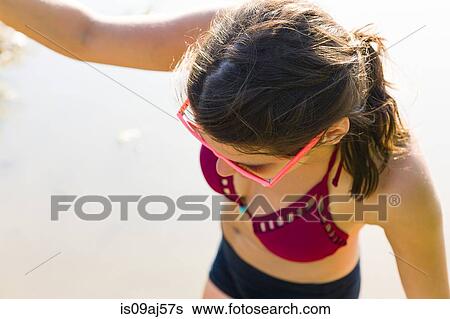 High angle view of young woman in river View Large Photo Image Stock Photograph - High angle view of young woman in river. Fotosearch