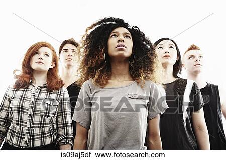 Low angle studio portrait of five young adults looking upward View Large Photo Image Stock Image - Low angle studio portrait of five young adults looking upward. Fotosearch