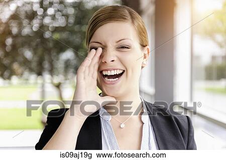Portrait of young businesswoman shouting View Large Photo Image Stock Image - Portrait of young businesswoman shouting. Fotosearch