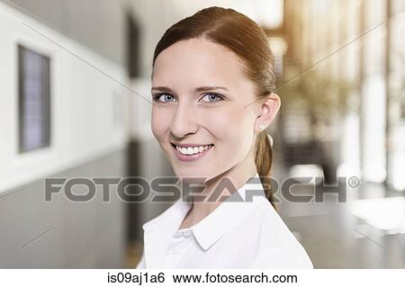 Portrait of young businesswoman View Large Photo Image Stock Photograph - Portrait of young businesswoman. Fotosearch