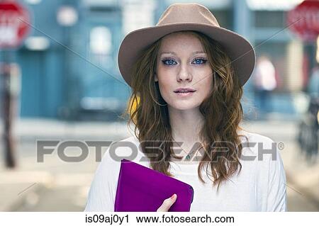 Portrait of young woman View Large Photo Image Stock Image - Portrait of young woman. Fotosearch