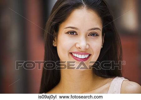 Stock Image - Portrait of young woman. Fotosearch