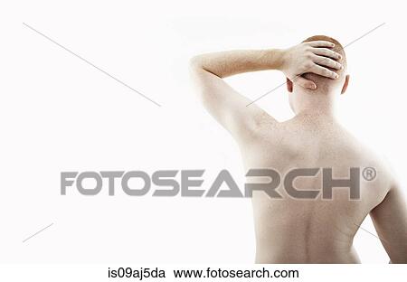 Rear view studio portrait of young man with bare back and hand on his head View Large Photo Image Stock Image - Rear view studio portrait of young man with bare back and hand on his head. Fotosearch