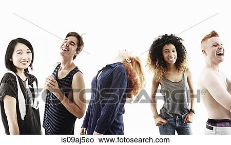 Studio portrait of five smiling young adults in a row View Large Photo Image Picture - Studio portrait of five smiling young adults in a row. Fotosearch