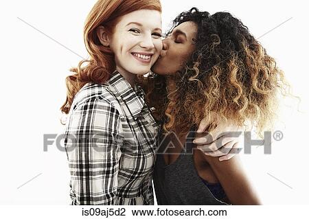Studio portrait of two young adult women friends View Large Photo Image Stock Image - Studio portrait of two young adult women friends. Fotosearch