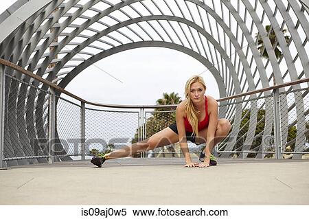 Woman stretching, Tongva Park, Santa Monica, California, USA View Large Photo Image Stock Photography - Woman stretching, Tongva Park, Santa Monica, California, USA. Fotosearch