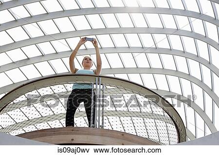 Stock Photo - Woman taking selfie, Tongva Park, Santa Monica, California, USA. Fotosearch