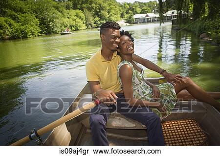Young couple on rowing lake in Central Park, New York City, USA View Large Photo Image Stock Photography - Young couple on rowing lake in Central Park, New York City, USA. Fotosearch