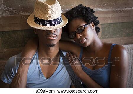 Young couple with eyes closed in Bethesda Terrace arcade, Central Park, New York City, USA View Large Photo Image Picture - Young couple with eyes closed in Bethesda Terrace arcade, Central Park, New York City, USA. Fotosearch