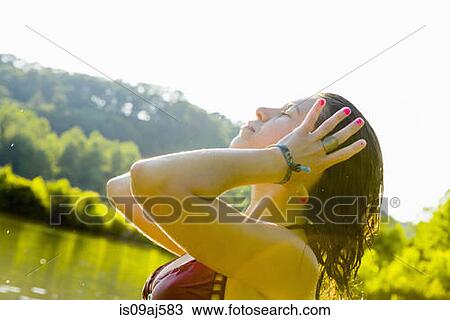 Young woman with hands in her hair, Delaware Canal State Park, New Hope, Pennsylvania, USA View Large Photo Image Stock Image - Young woman with hands in her hair, Delaware Canal State Park, New Hope, Pennsylvania, USA. Fotosearch