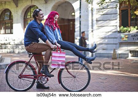 Young woman with sitting on boyfriends bicycle handlebars, Cape Town, South Africa View Large Photo Image Picture - Young woman with sitting on boyfriends bicycle handlebars, Cape Town, South Africa. Fotosearch