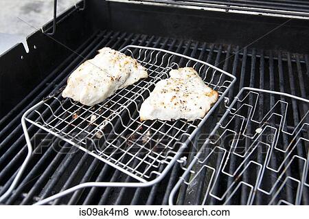 Barbecue with grilled meat ready to eat View Large Photo Image Stock Photo - Barbecue with grilled meat ready to eat. Fotosearch