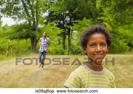 Boys in a forest View Large Photo Image Stock Image - Boys in a forest. Fotosearch