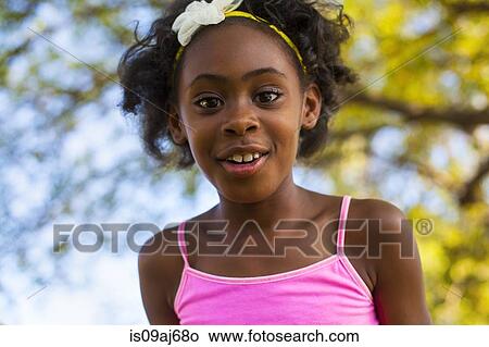 Portrait of girl with flower hairband View Large Photo Image Picture - Portrait of girl with flower hairband. Fotosearch
