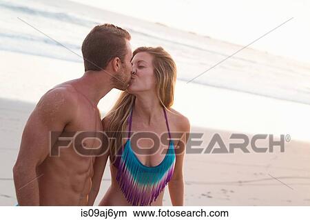 Romantic couple kissing on beach, Nosara, Guanacaste, Costa Rica View Large Photo Image Picture - Romantic couple kissing on beach, Nosara, Guanacaste, Costa Rica. Fotosearch