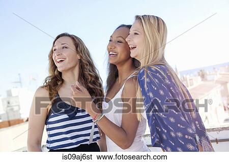 Teenage girls laughing View Large Photo Image Stock Photograph - Teenage girls laughing. Fotosearch