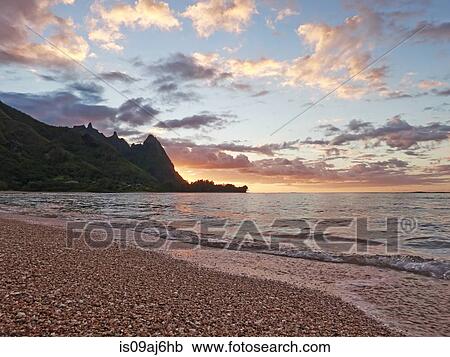 Tunnels Beach at sunset, Kaua'i, Hawaii, USA View Large Photo Image Stock Image - Tunnels Beach at sunset, Kaua'i, Hawaii, USA. Fotosearch