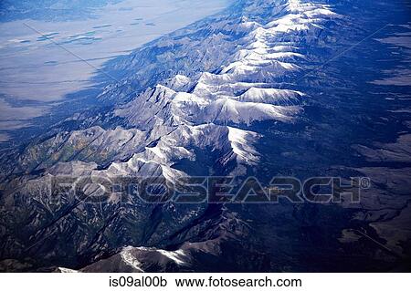 Aerial view over mountains View Large Photo Image Stock Image - Aerial view over mountains. Fotosearch