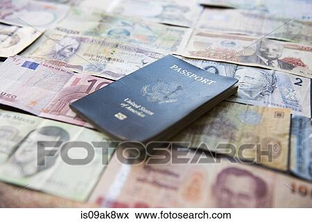 Banknotes of various countries and U. S. passport View Large Photo Image Stock Photo - Banknotes of various countries and U. S. passport. Fotosearch
