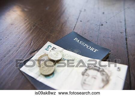 British banknote, coins and passport View Large Photo Image Stock Photo - British banknote, coins and passport. Fotosearch