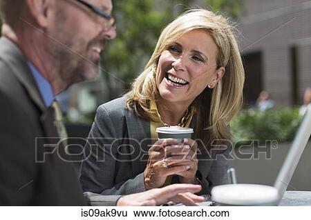 Business colleagues on coffee break View Large Photo Image Stock Photograph - Business colleagues on coffee break. Fotosearch