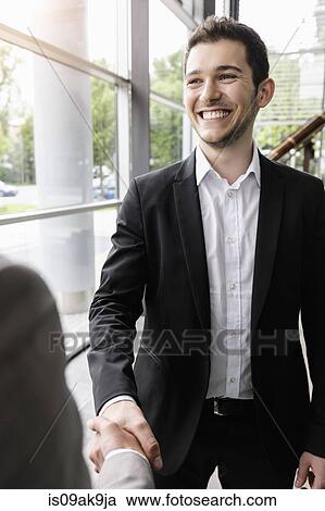 Businessmen shaking hands View Large Photo Image Stock Image - Businessmen shaking hands. Fotosearch