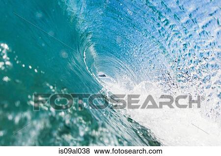Close up of rolling wave splashing above View Large Photo Image Stock Photo - Close up of rolling wave splashing above. Fotosearch