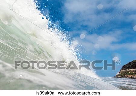 Stock Image - Close up side view of ocean wave, Encinitas, California, USA. Fotosearch