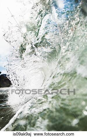 Close up side view of rolling ocean wave, Encinitas, California, USA View Large Photo Image Stock Image - Close up side view of rolling ocean wave, Encinitas, California, USA. Fotosearch