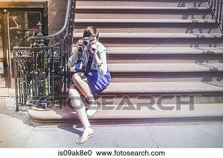 Photographer sitting on steps, New York, US View Large Photo Image Stock Image - Photographer sitting on steps, New York, US. Fotosearch