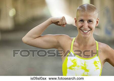 Portrait of determined young female cancer survivor View Large Photo Image Stock Photo - Portrait of determined young female cancer survivor. Fotosearch