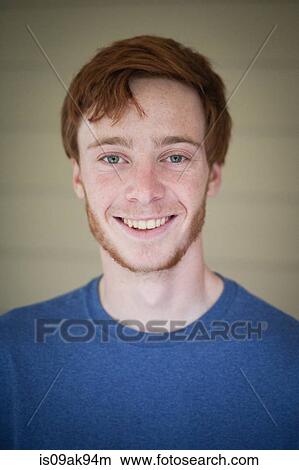 Picture - Portrait of smiling teenage boy with red hair. Fotosearch