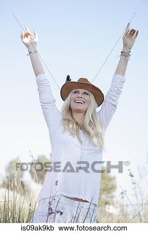 Woman enjoying nature View Large Photo Image Stock Image - Woman enjoying nature. Fotosearch