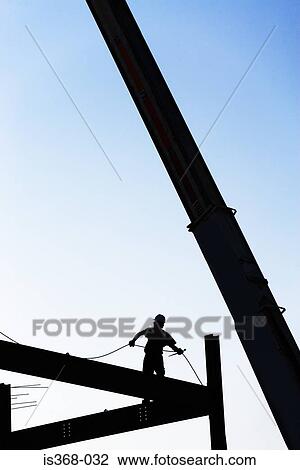 Construction worker on framework View Large Photo Image Stock Image - Construction worker on framework. Fotosearch