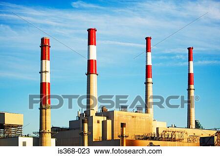 Stock Image - Industrial plant with smokestacks. Fotosearch