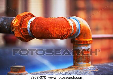Stock Image - Rusty water pipe. Fotosearch
