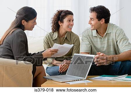 Couple with a financial advisor View Large Photo Image Stock Photo - Couple with a financial advisor. Fotosearch