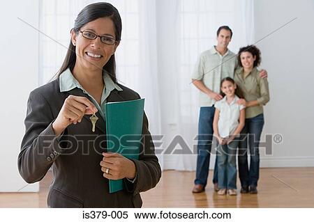 Stock Photography - Family in their new home. Fotosearch