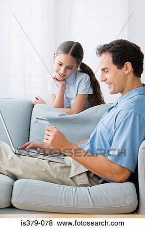 Father shopping online View Large Photo Image Stock Photo - Father shopping online. Fotosearch