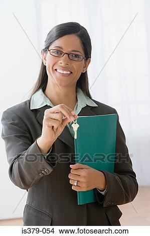 Picture - Female estate agent. Fotosearch
