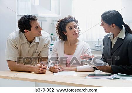 Financial advisor with couple View Large Photo Image Stock Image - Financial advisor with couple. Fotosearch