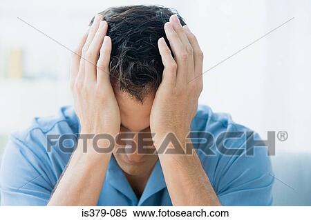 Man with head in hands View Large Photo Image Stock Photography - Man with head in hands. Fotosearch