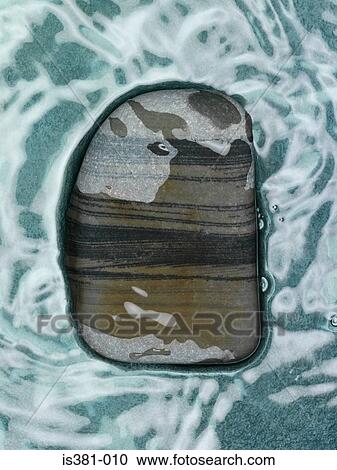 Striped pebble View Large Photo Image Stock Image - Striped pebble. Fotosearch