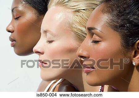 Picture - Profile of three young women. Fotosearch
