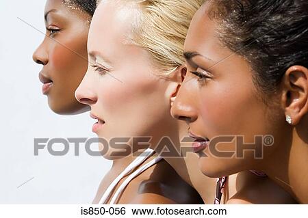 Stock Photograph - Profile of three young women. Fotosearch