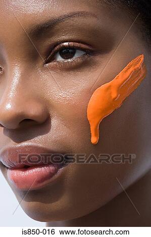 Sunblock on a womans face View Large Photo Image Stock Photograph - Sunblock on a womans face. Fotosearch